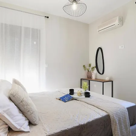 Angelika Lindos By *